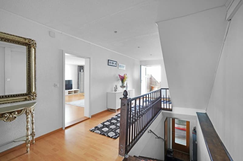 Attractive residential and commercial building with 5.3% return & development potential (12)