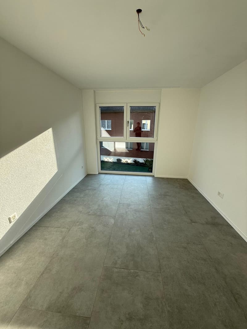 empty room, large window, tiled floor, white walls