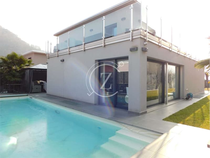 Moderna casa con piscina a Bedano (4)