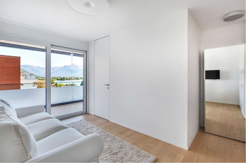Meraviglioso appartamento attico di 6.5 locali con vista lago a Minusi (13)