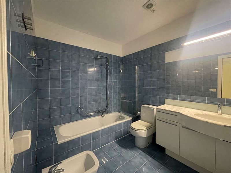 Appartement lumineux de 3,5 pièces à Gentilino avec grande terrasse couverte et vue (6)