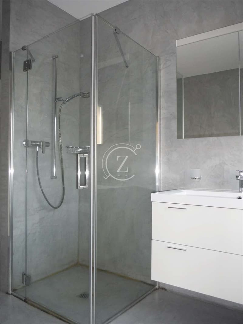 Moderno e luminoso attico con vista lago e piscina a Cagiallo (13)