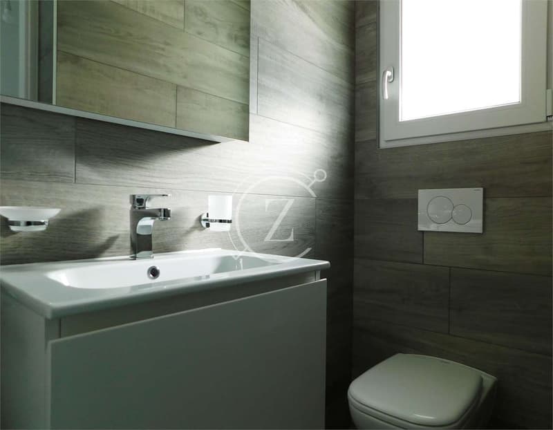 3.5 LOCALI CON VISTA LAGO, PISCINA E GIARDINO (10)