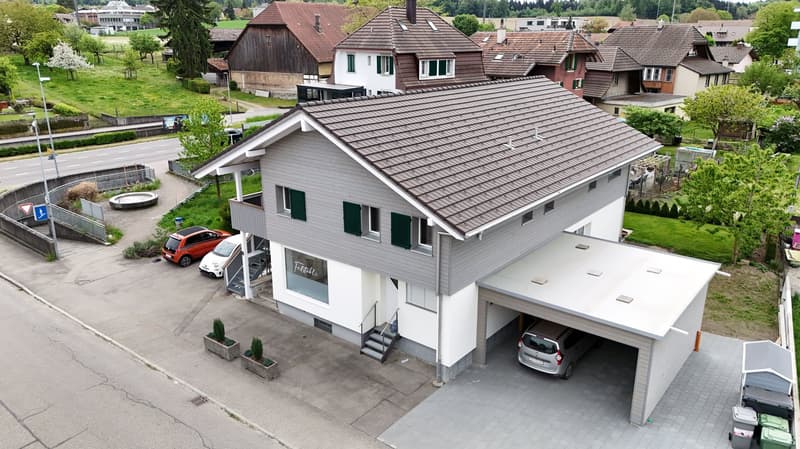 Einmaliges Mehrfamilienhaus mit Zwei Wohnungen und Ladenlokal (1)