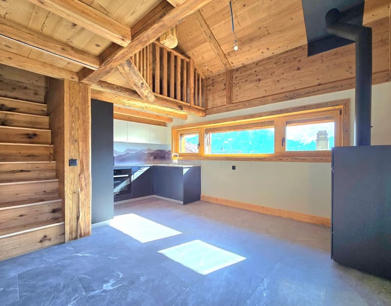 wooden ceiling, wooden stairs, kitchen with oven, sink, cabinets, fireplace, large windows