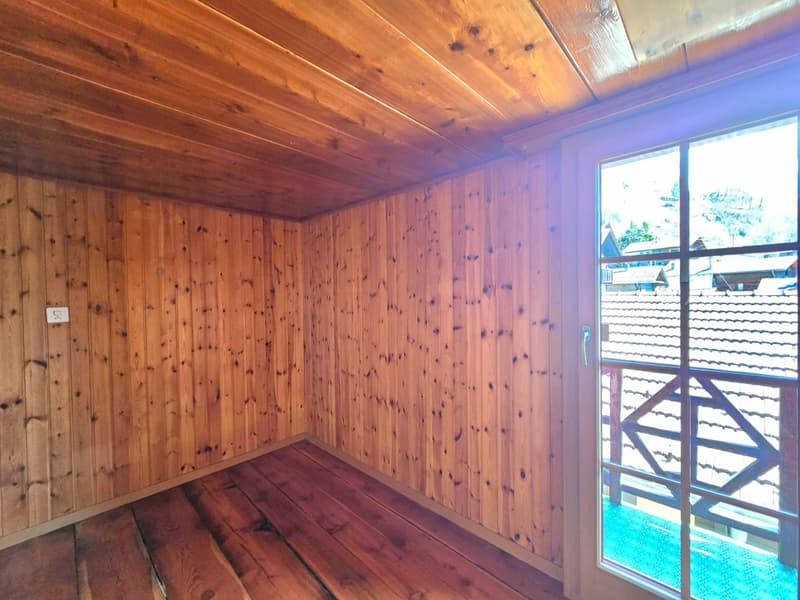 wooden walls, wooden floor, glass door, balcony