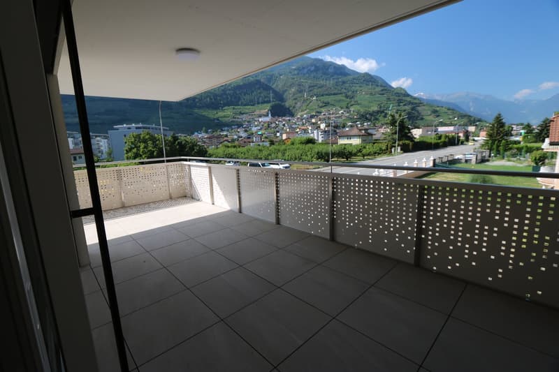 1er LOYER OFFERT ! Appartement neuf de 3.5 pièces avec balcon et vue sur les montagnes à Saxon (1)