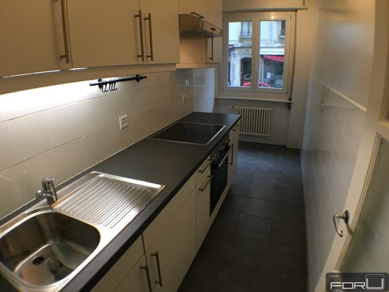 Appartement moderne de 3 pièces aux Pâquis (4)