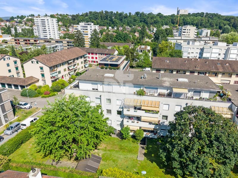 Family-friendly, sunny, and well-maintained with two balconies, garden seating, and garage (1)