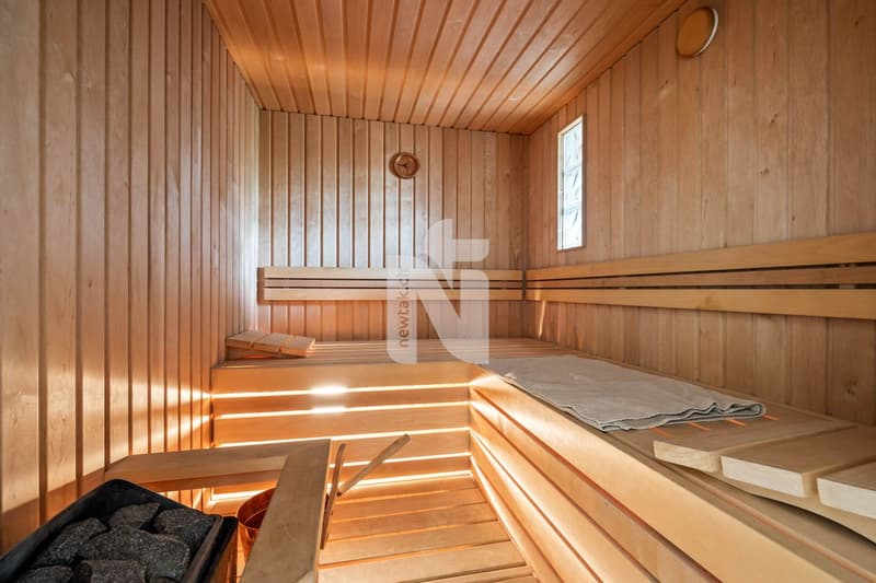 Ampio e luminoso: appartamento di 4,5 locali con sauna, balcone e posto auto sotterraneo (12)