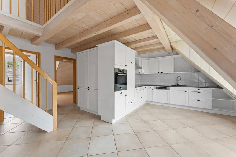 modern kitchen with white cabinets, wooden beams, tiled floor, stainless steel appliances, sink with faucet