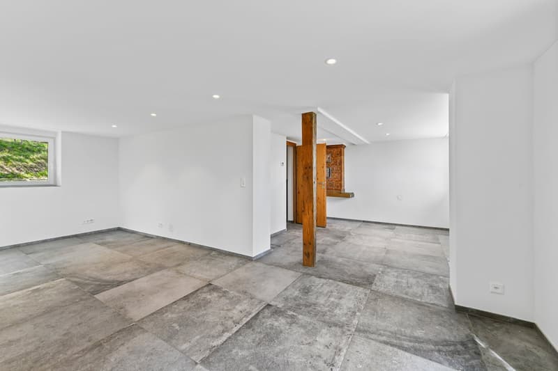 empty room, white walls, gray tiles, wooden pillar, window, power outlets