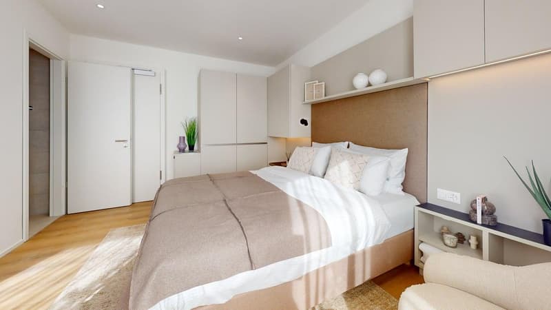 double bed, wooden floor, white walls, white doors, window, nightstands, decorative objects, rug, carpet