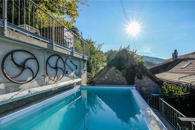 Casa unifamiliare di 4,5 locali con potenziale di ampliamento e grande terreno! (1)