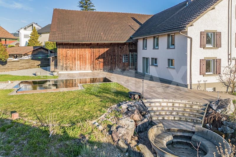Casa di 6 locali elegantemente curata con piscina naturale e grande giardino (7)