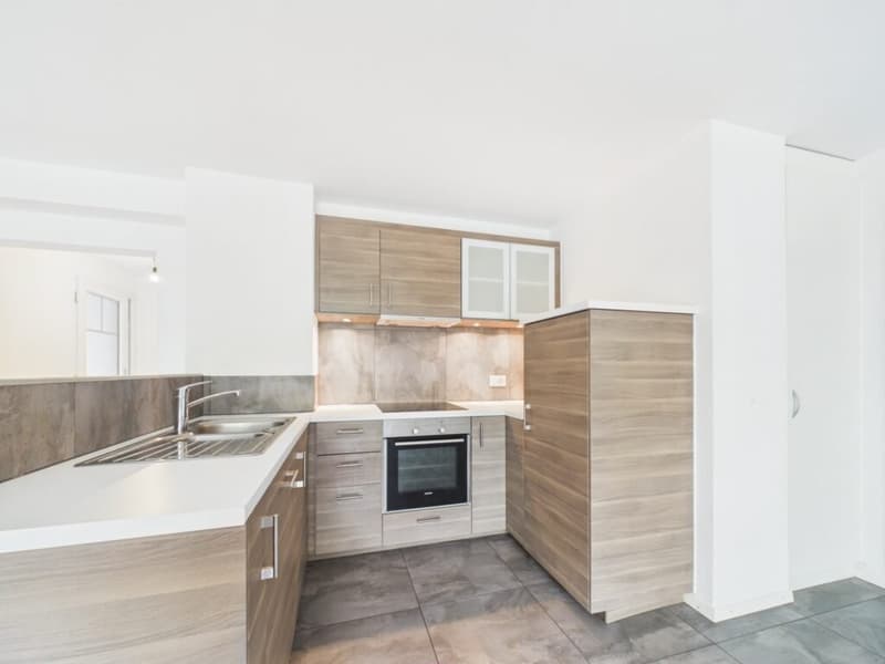 Appartement de 2.5 pièces au RDC avec jardin à Villeneuve (2)