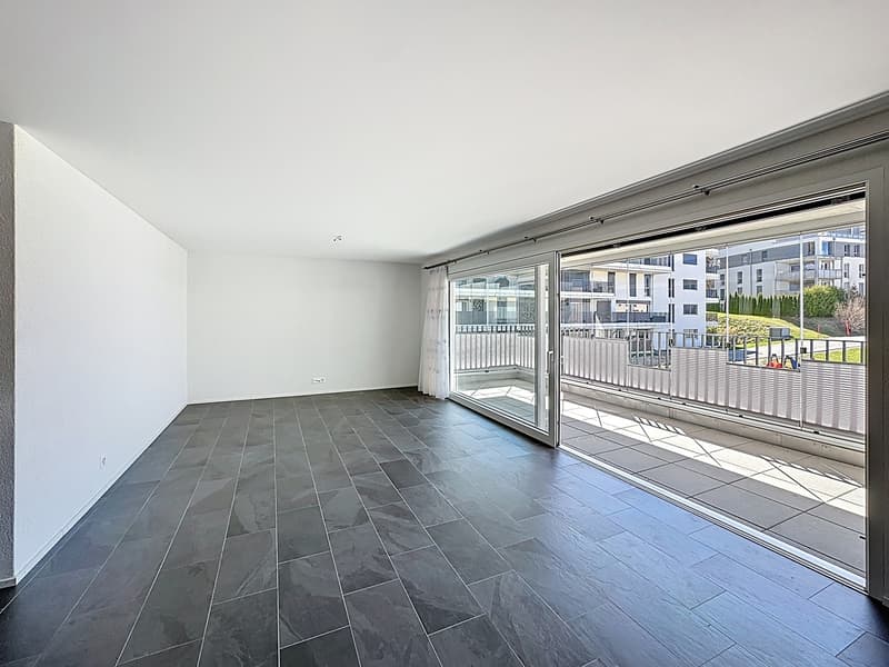 Appartamento in sottotetto di 4.5 locali con grande balcone/terrazza (3)