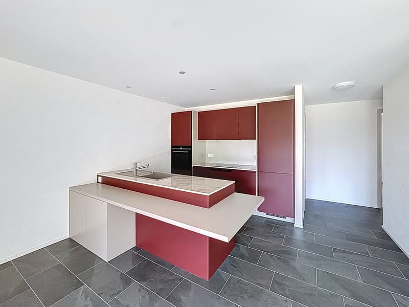 Appartamento in sottotetto di 4.5 locali con grande balcone/terrazza (2)
