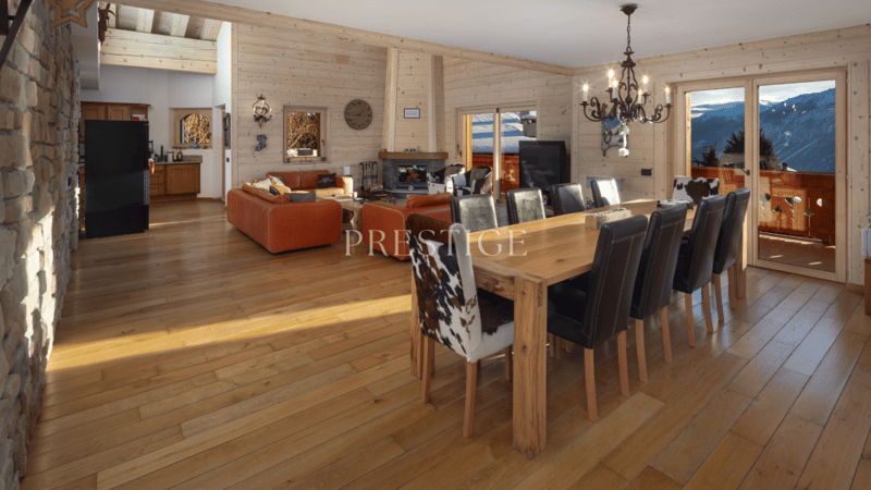 dining room, wooden floors, dining table, chairs, fireplace, large windows
