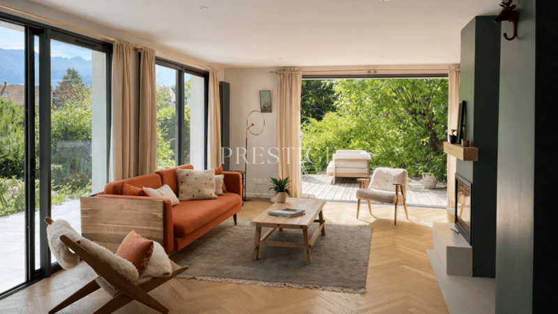 wooden floor, orange sofa, glass wall, fireplace, couch, armchairs, coffee table