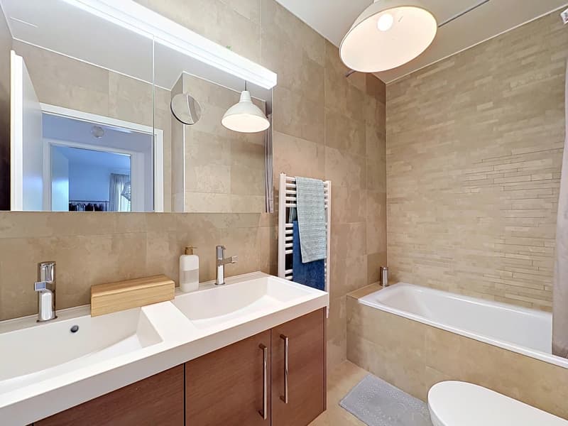 Appartement de 2.5 pièces avec véranda et jardin privatif à Saint-Sulpice (6)
