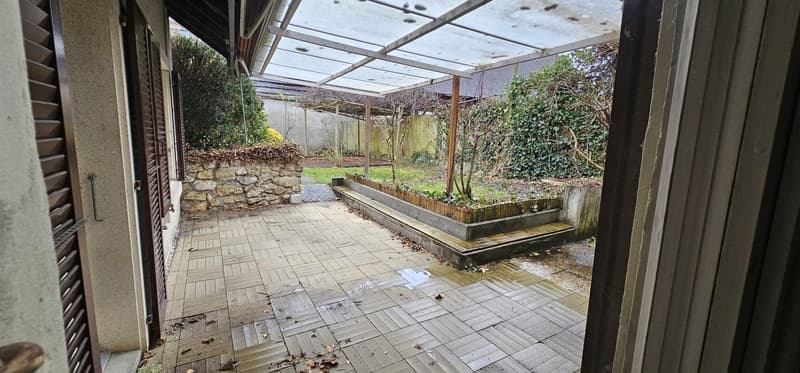 tiled floor, garden, pergola, paved path, stone wall, plants