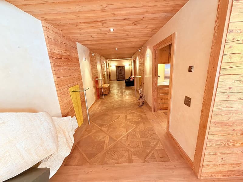 wooden walls, tiled floor, hallway, wooden beams on ceiling, white painted walls