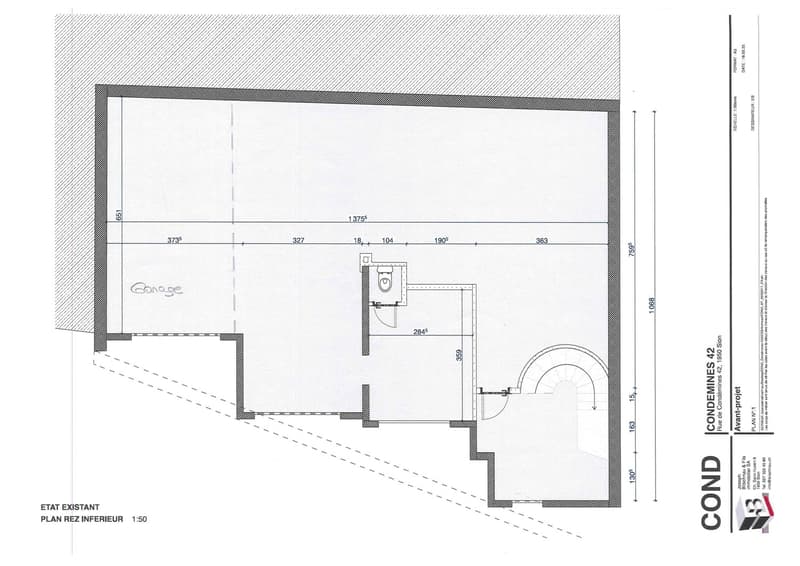 The image shows a floor plan of a property. It includes a garage, a bathroom, and an open space labeled 'Garage'.