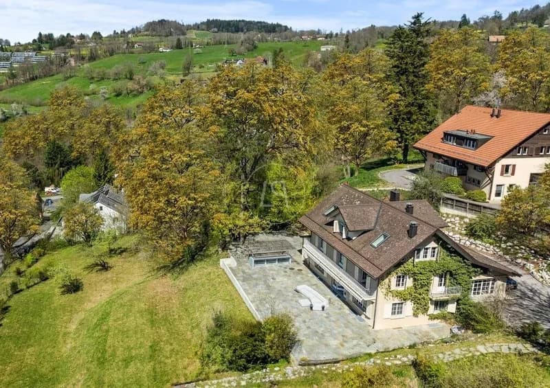 Proprietà con alto potenziale di sviluppo e vista panoramica a Lutry (1)