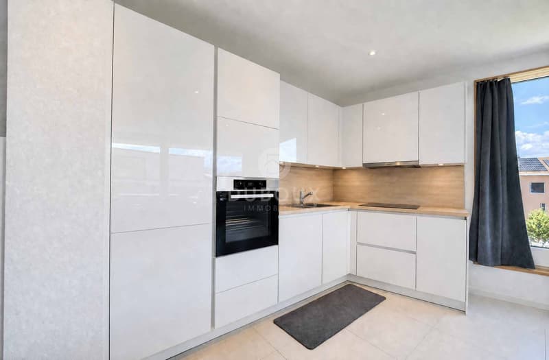 SUPERBE 2.5 PIÈCES RÉCENT AVEC BALCON COUVERT (3)
