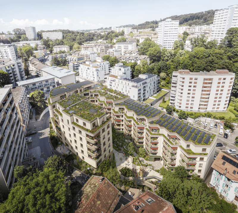 Green rooftops, balconies, solar panels, surrounded by trees, multiple stories, garden areas, parking