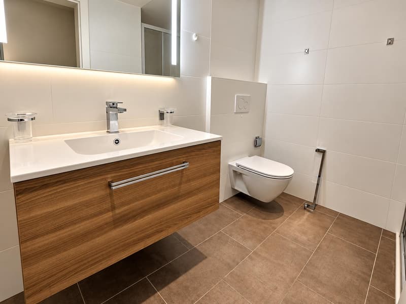 Magnifique duplex de 3 pièces au 2ème étage - Centre d'Avenches avec vue sur les arènes (9)