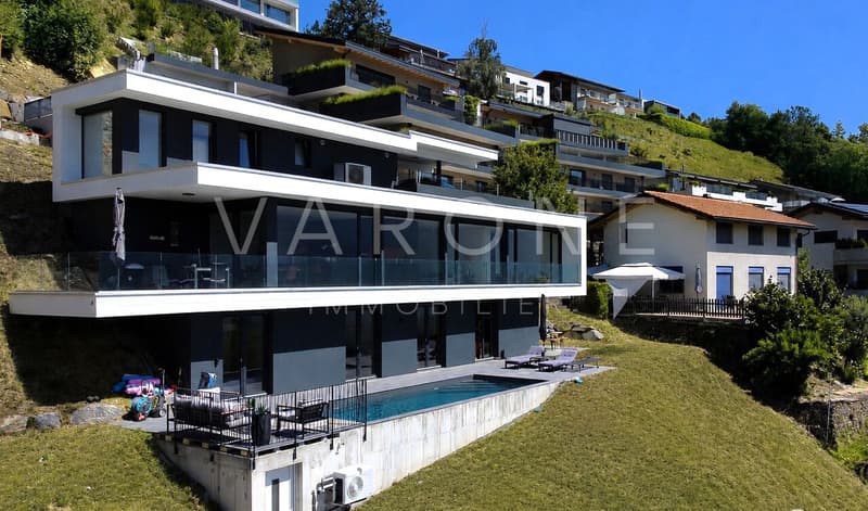 Villa contemporanea di 6,5 locali con piscina e vista panoramica (1)