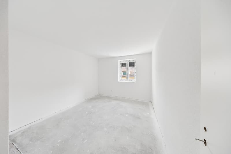 Une pièce polyvalente pouvant accueillir une chambre, un bureau ou une chambre d'amis selon vos besoins.