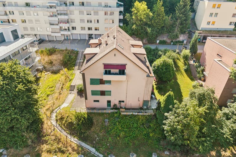 Immeuble de rendement de 8 logements entièrement loué, offrant un rend (6)