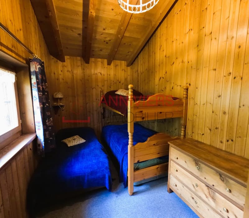 Chambre à coucher triple