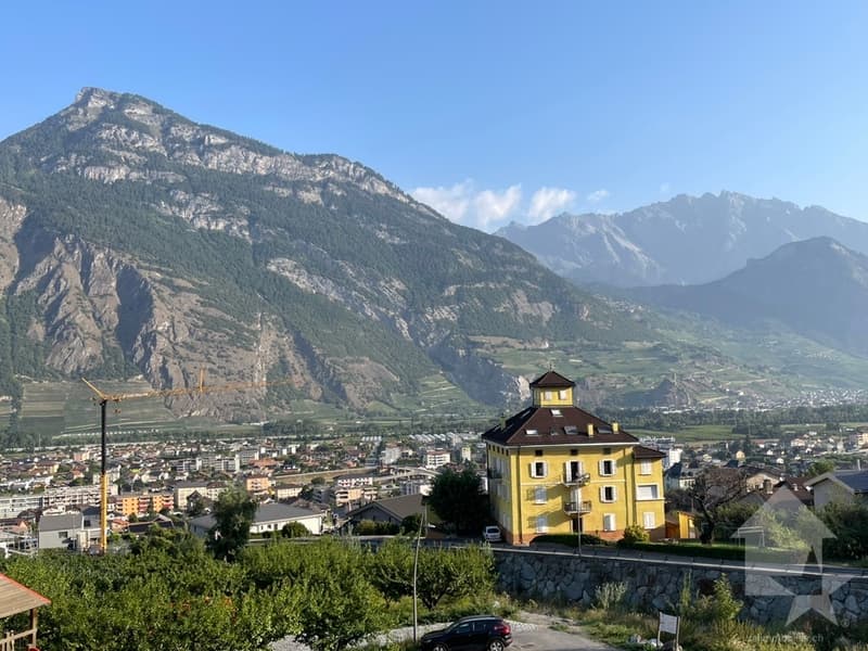 Appartamento 3,5 locali di 96m2 con giardino di 38m2 e 2 posti auto (3)
