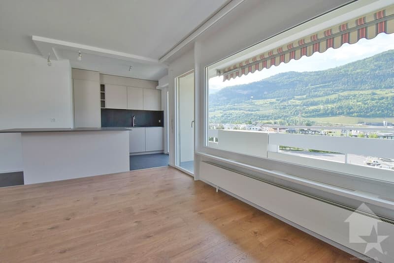 4.5 pièces avec une magnifique vue et 1 place de parc intérieure (4)