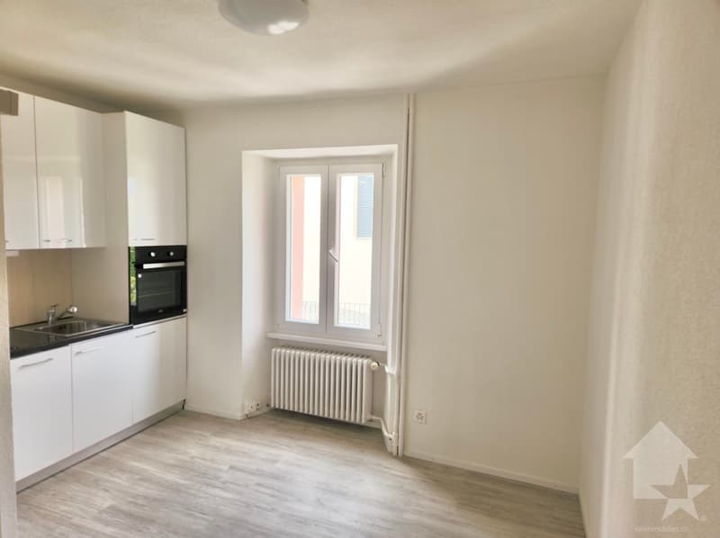 Immeuble de 5 appartements et un restaurant au centre du village ! (13)