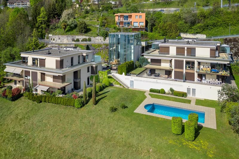 Superbo penthouse con enorme terrazza e vista panoramica sul lago (10)