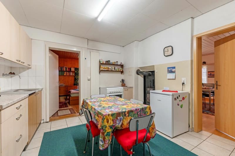 Casa con due appartamenti di 2,5 locali e potenziale di sviluppo nel centro del villaggio tranquillo di Remigen (10)