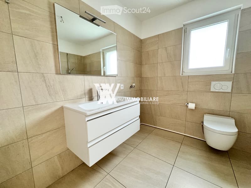 CHIASSO: BRIGHT 2.5-ROOM APARTMENT WITH DOUBLE TERRACE (7)