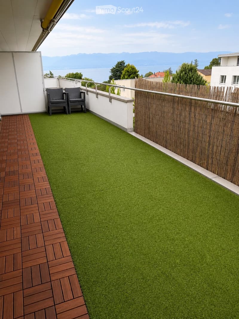 Attico di 3 locali con grande terrazza e vista sul lago (1)