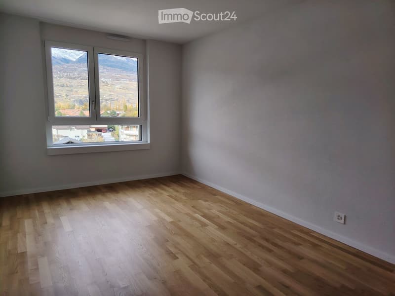 Appartement 2,5 pièces avec vue + place de parc intérieure (4)