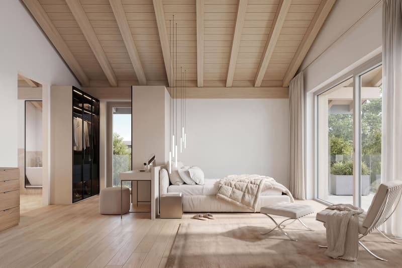 modern bedroom with wooden floor, white walls, large windows, bed, bedside table, chair, rug, closet