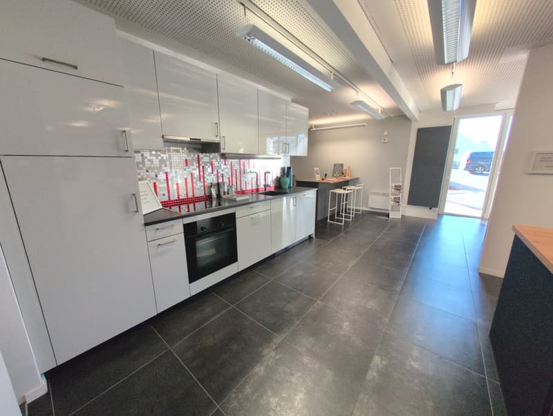 kitchen, white cabinetry, tile flooring, stainless steel appliances, countertop