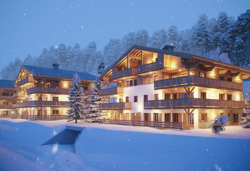 wooden exterior, multiple story, large windows, several balconies, snow covered