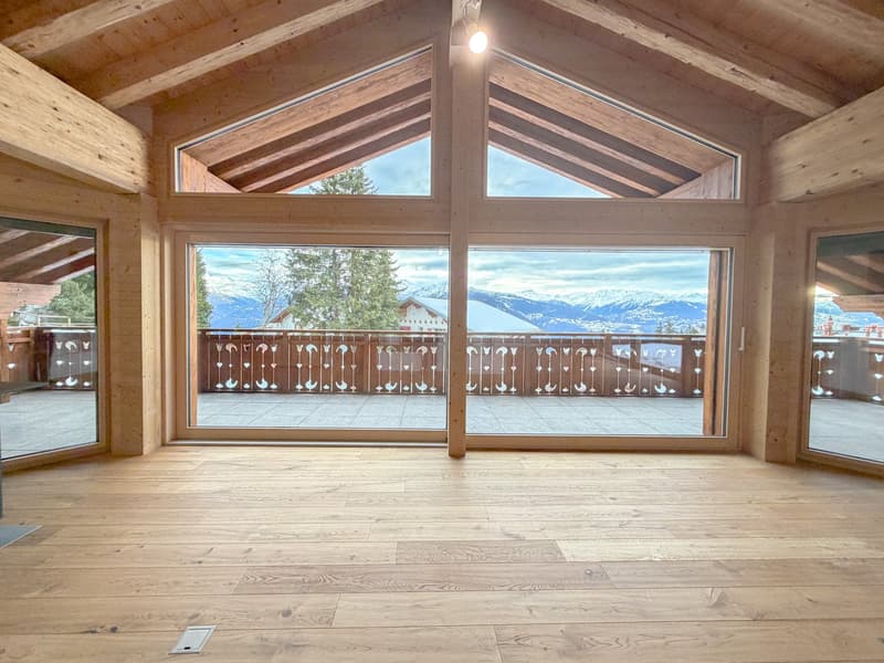 wooden floor, large windows, balcony, glass doors, wooden beams, view