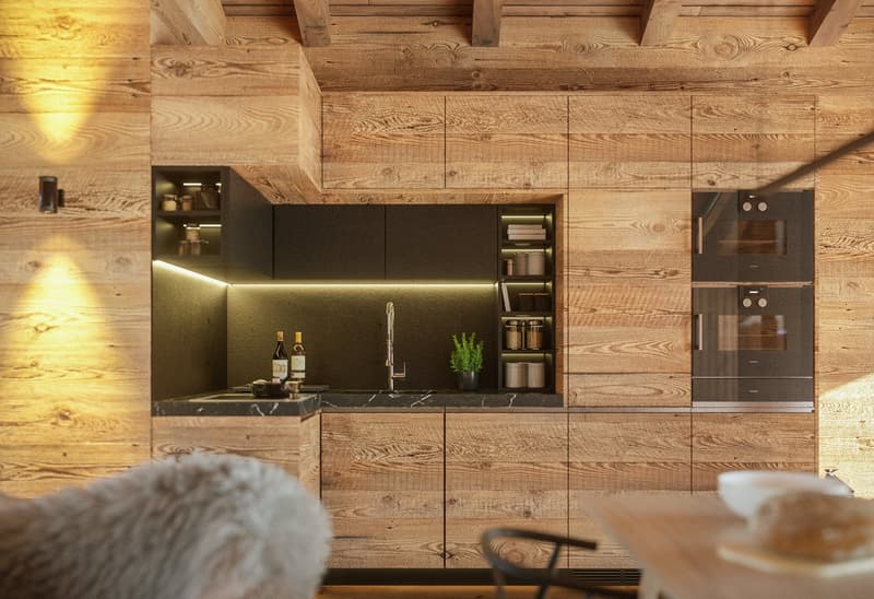 wooden walls, countertop with sink, cabinets, faucet, open shelves, oven, bottle, small potted plant, table, and chair
