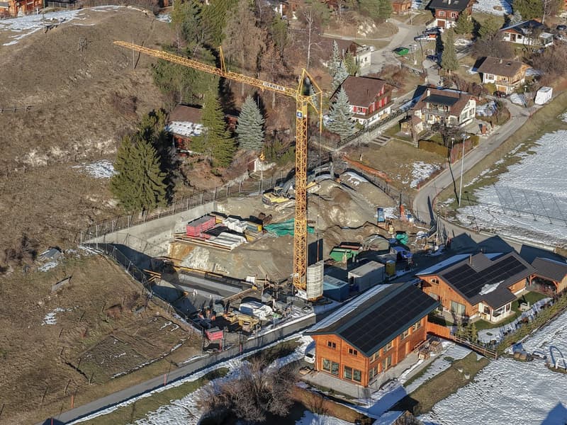 construction site, crane, solar panels, winter landscape